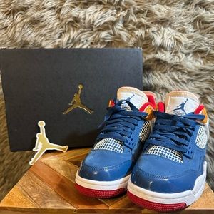 Blue and Red Jordan 4 Retro Messy Room (GS) in a size 5Youth 6Wms 5Mens